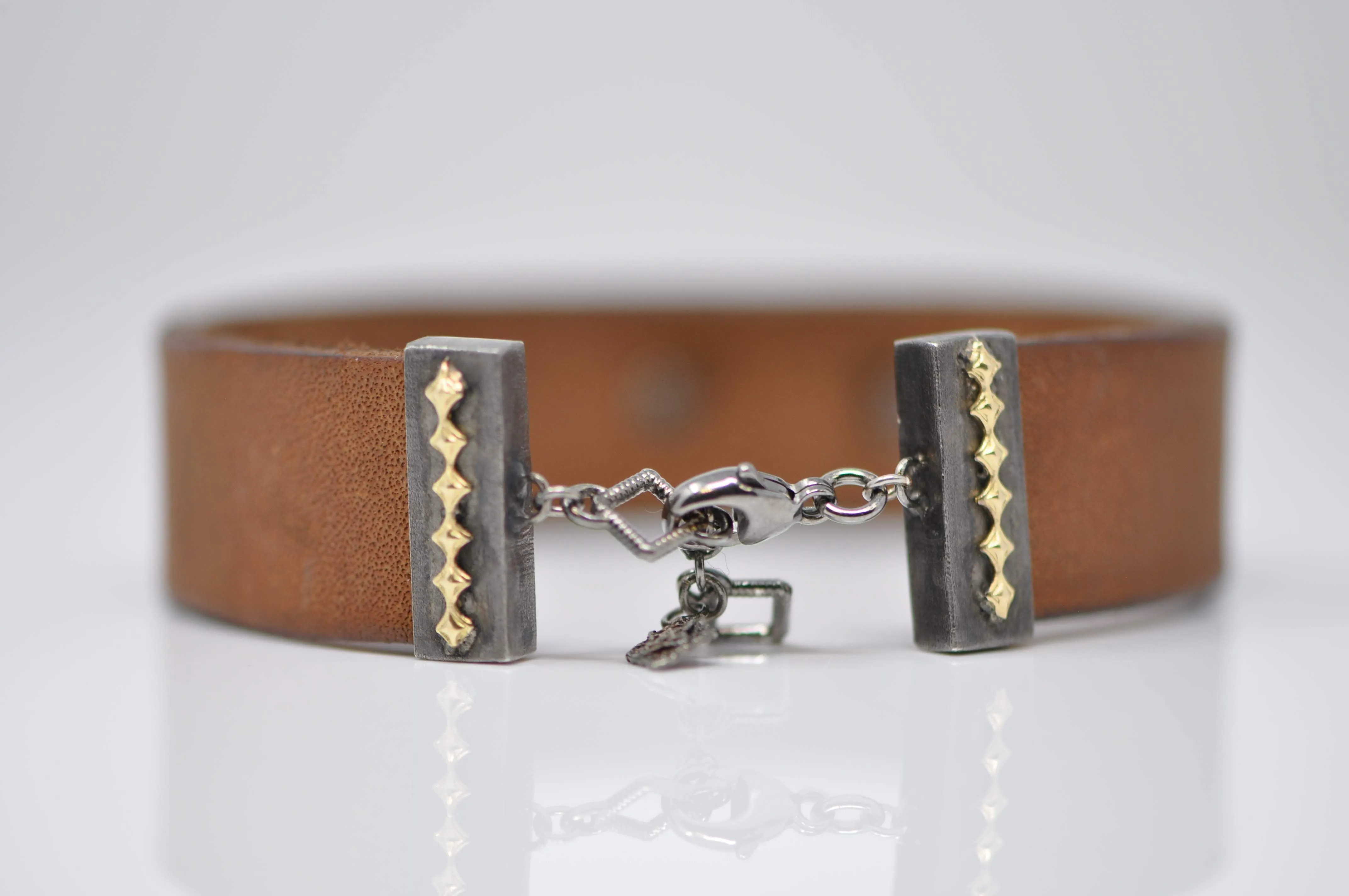ARTIFICAT LEAHTER CUFF WITH CRIVELLIS AND CHAMPAGNE DIAMONDS