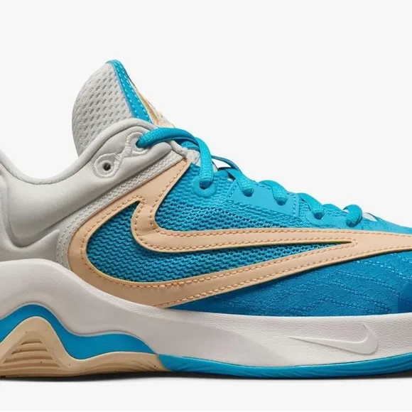 X SALE X Nike Blue Athletic Shoes with Cream Accents